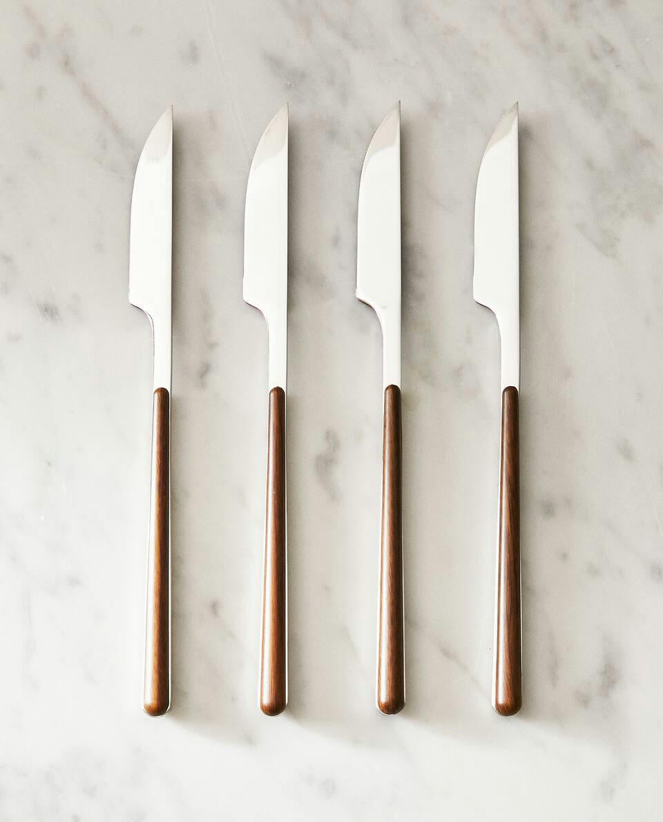 BOX 4 KNIVES WITH ROUND HANDLE DETAIL